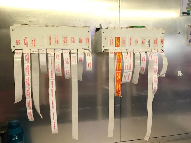 Stickers for applying to meat cuts